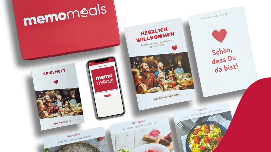 Memo Meals Box mit Heften und Smartphone.