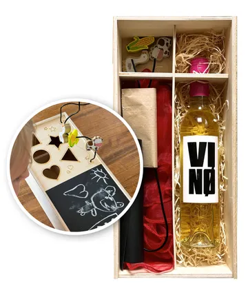 Geschenkbox mit Wein und Zeichenbrett.