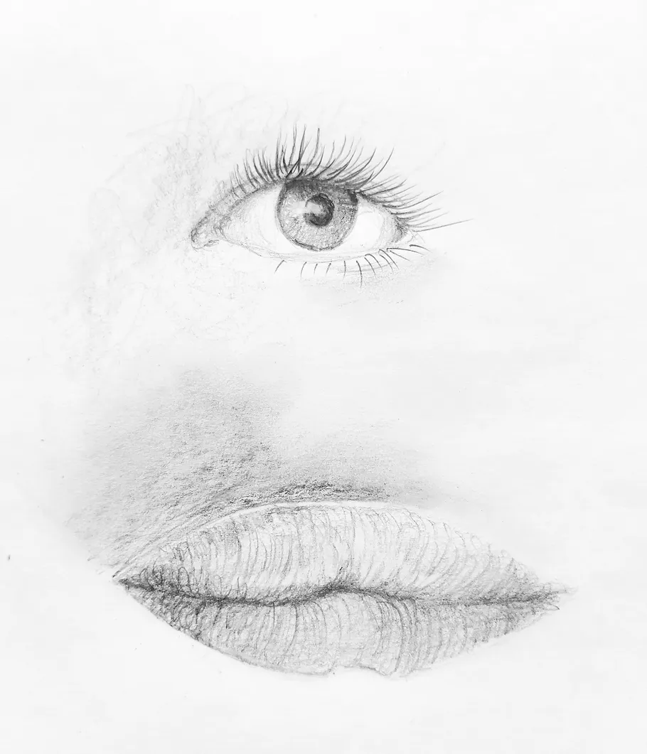 Pencil drawing of an eye and lips.