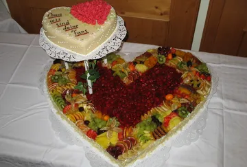 Heart-shaped fruit cake with decorative marzipan top.