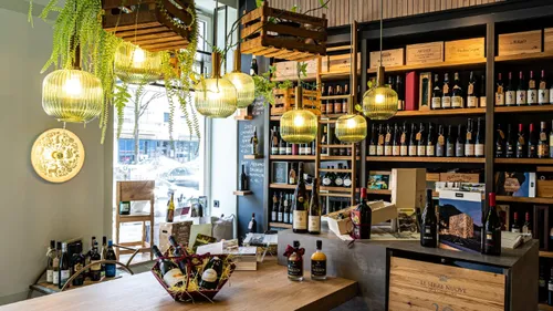 Wine shop interior with hanging lights.