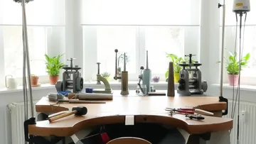 Jeweler's desk with tools by window.