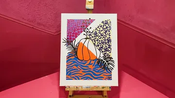Colorful abstract painting on an easel.