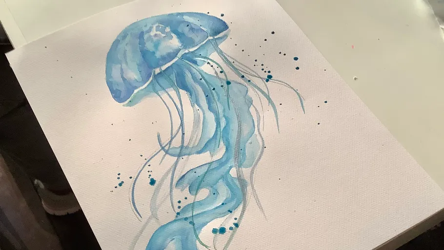 Blue jellyfish watercolor painting on paper.