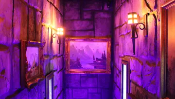 Hallway with paintings and purple lighting.