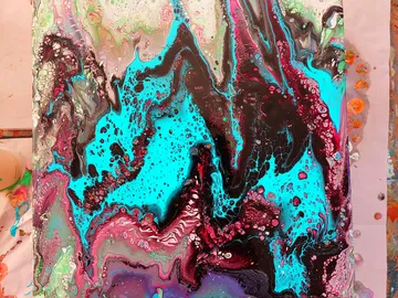 Colored painting with blue, black and red areas of color.