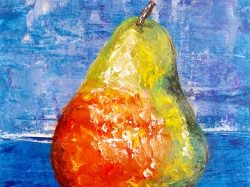 Pear stands against a blue background, showing vivid colors.