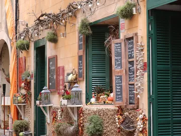 Small cafés with menus decorated for the season.