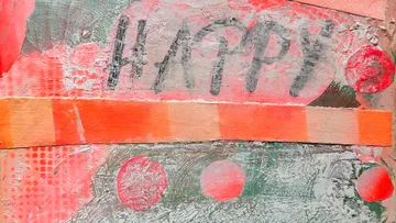 Textured artwork with "HAPPY" and circles.