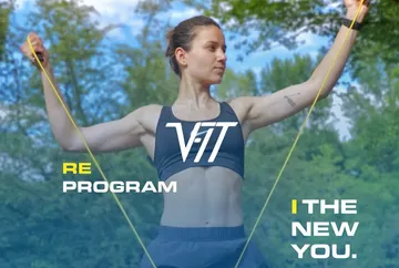 Woman exercising with resistance bands outdoors.
