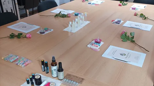 Table prepared for aromatherapy session with supplies.