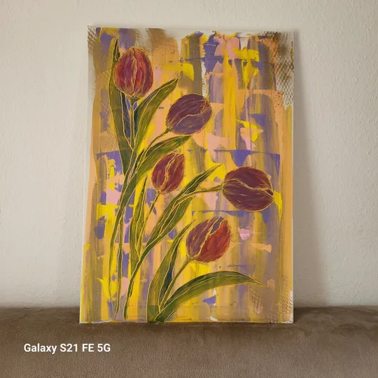 Colorful tulip painting on wall.