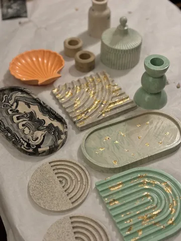 Assorted decorative objects on a white surface.
