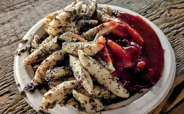 Plate of poppy seed noodles with sauce.