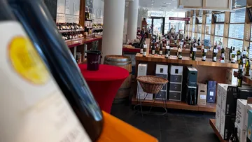 Wine shop interior with bottles displayed.