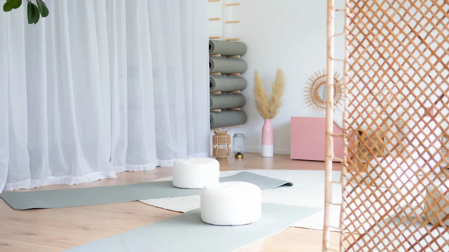 Yoga mats and cushions in a zen studio.