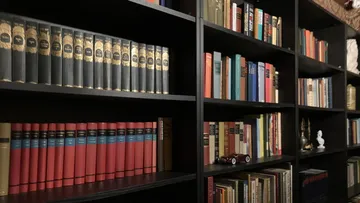 Bookshelves filled with various books.
