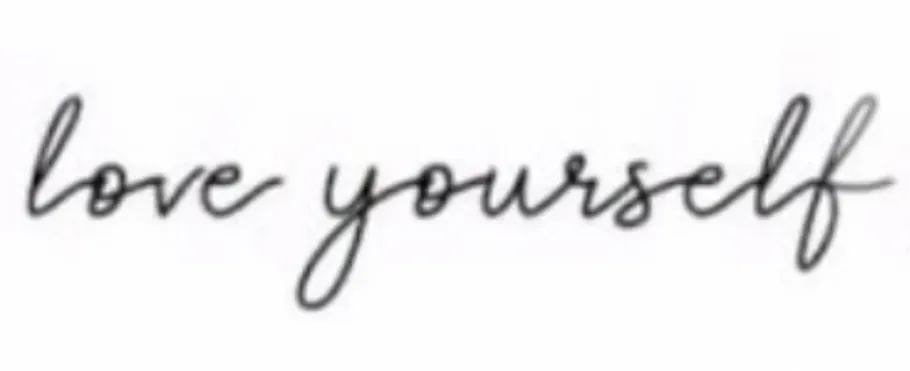 Script text: love yourself on white background.