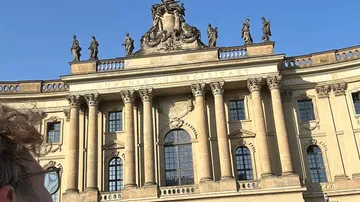 Humboldt University building with statues and columns.
