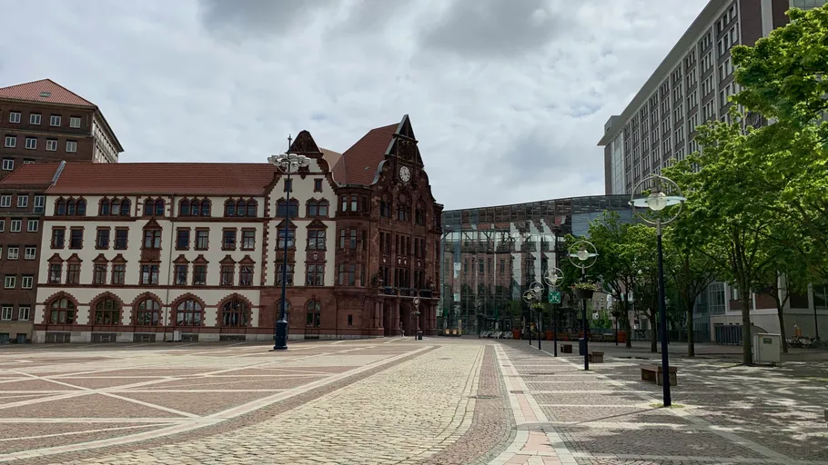 Historic building on an empty city square.