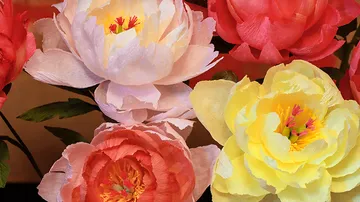 Colorful paper flowers in close-up view.