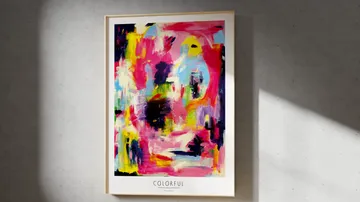 Abstract painting with vibrant colors on wall.