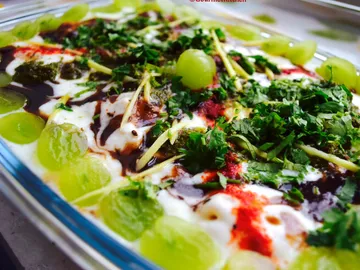 Green grape salad with yoghurt and fresh herbs.
