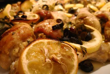 Lemon-chicken dish with olives, baked in oven.