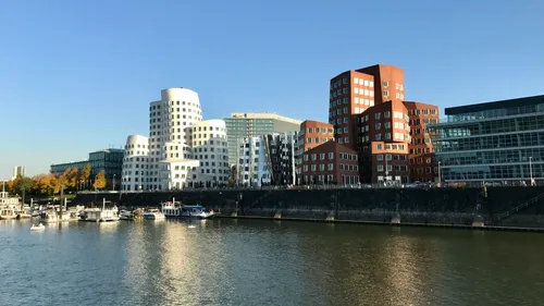 Modern buildings along the waterfront in Düsseldorf.
