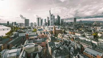 Skyline of Frankfurt with cloudy sky.