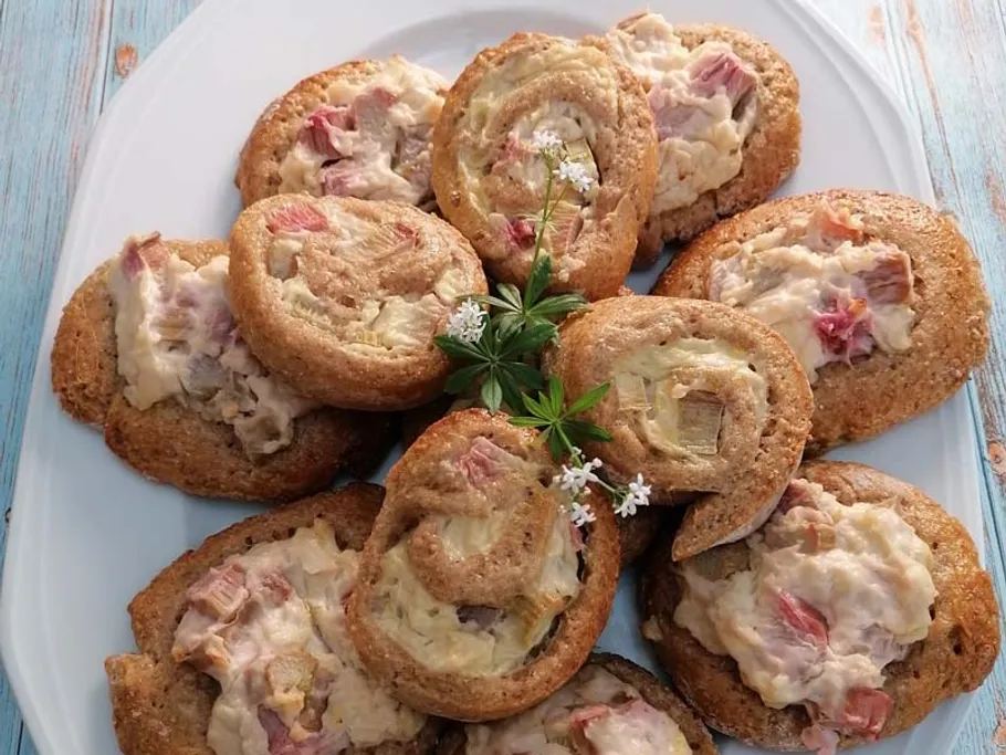 Plate of rhubarb pastries with garnish.