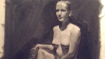 Charcoal drawing of a seated nude woman.