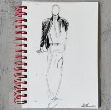 Modeskizze einer Figur in einem Notizbuch.
