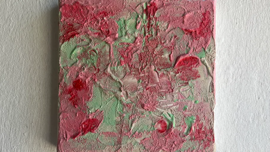 Texturierte Leinwand mit pinker und grüner abstrakter Farbe.