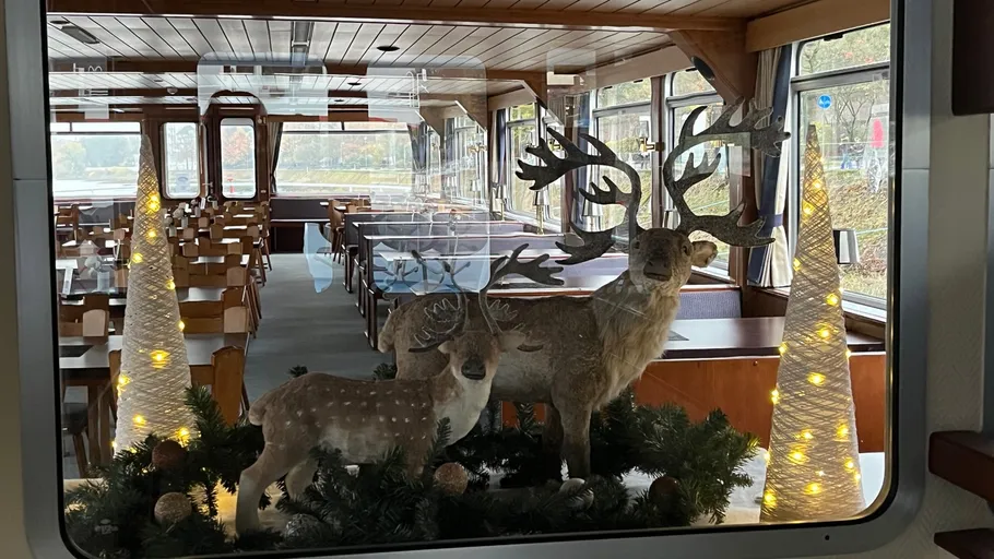 Reindeer decoration hanging inside a train.