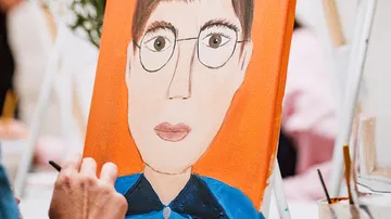 Portrait painting of a person on canvas.