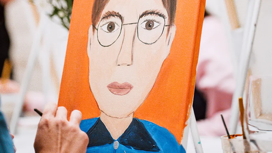 Painting of person with glasses on orange background.
