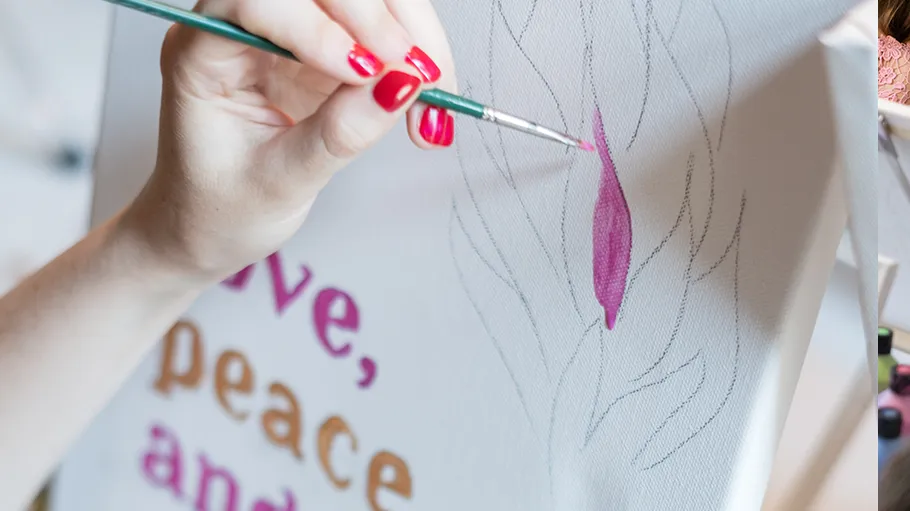 Hand painting on canvas with brush.