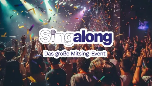 Crowd partying under colorful lights and confetti.