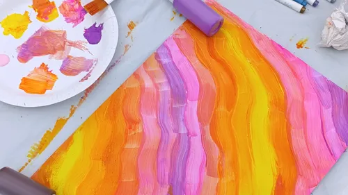 Abstract painting with warm colors and brushes.