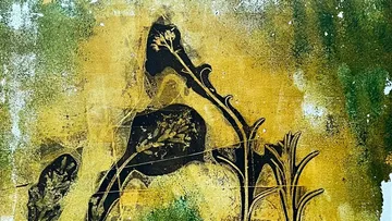 Abstract floral art with green and yellow tones.