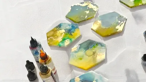 Hexagonal tiles painted with vibrant colors.