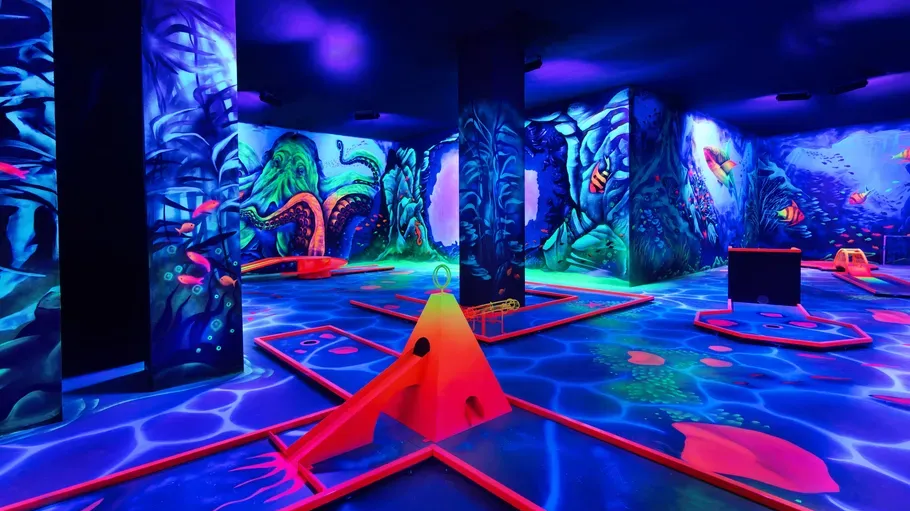 Neon mini-golf course with underwater theme.