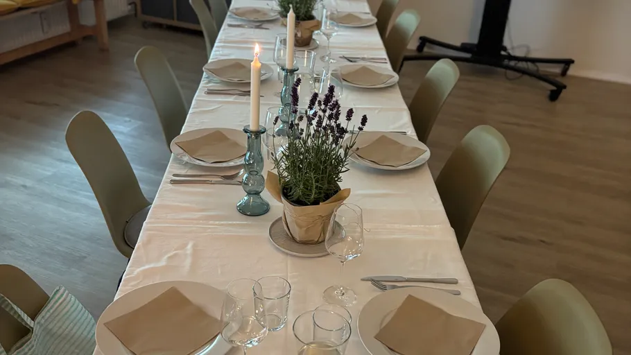 Elegant table with candles and lavender decor.