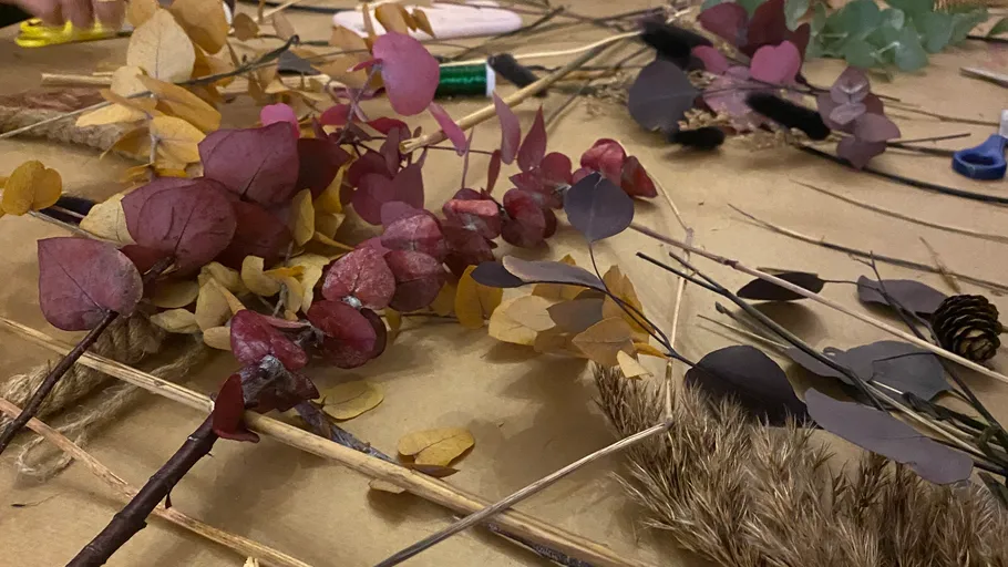 Various colored leaves arranged on a table.