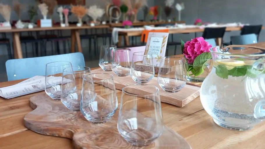 Empty glasses on wooden table, decorated setting.