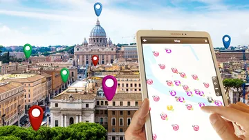 Tablet displays a digital map over a city.