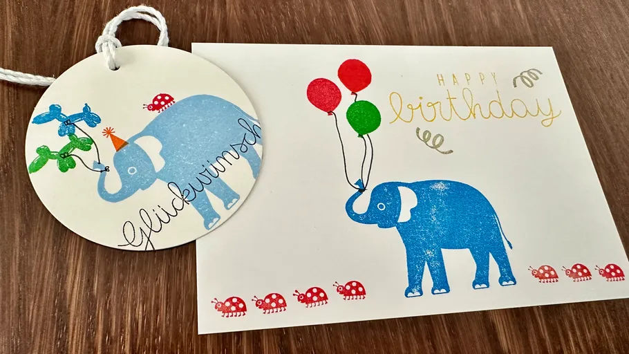 Elefant mit Ballons auf Geburtstagskarte.