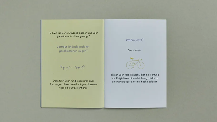 Open book with German text on pages.