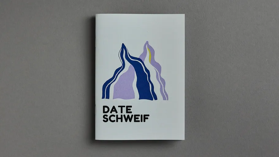 White booklet with abstract mountain design.